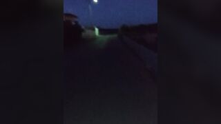 showing tits at dark street