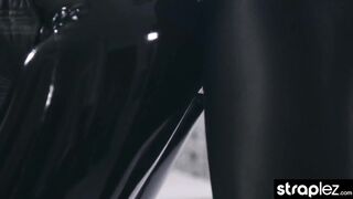 Sexy domme fucks her latex clad lesbian lover with a strap on