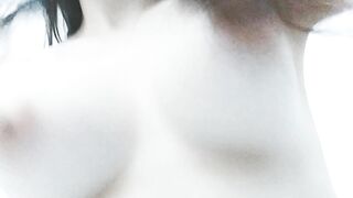 Bouncing my pale natural boobs from a funny angle.