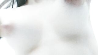 Bouncing my pale natural boobs from a funny angle.