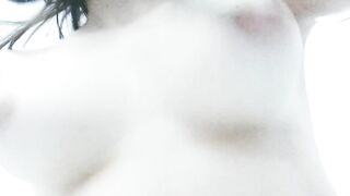 Bouncing my pale natural boobs from a funny angle.
