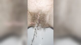 Sensual Slow Motion Piss by Mega Hairy Pussy Up Close