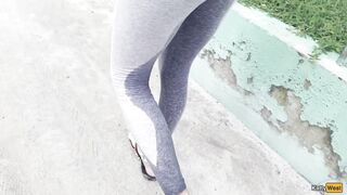Crazy girl wetting her leggings in public