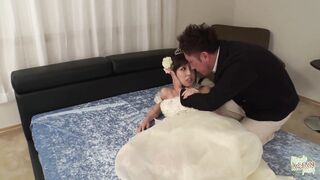 This Asian cutie was trying on her wedding dress and got creampied by two guys