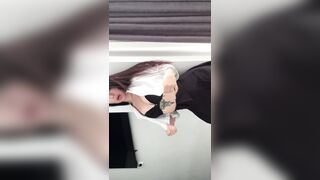 An aroused woman in a caress.