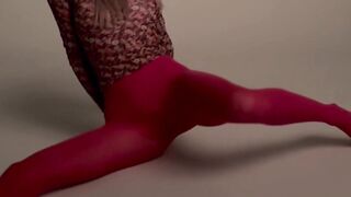 stretching long legs in red tights