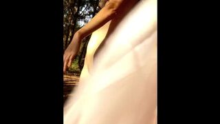 Hippie dancing naked in the woods