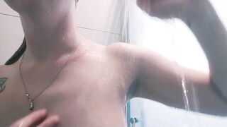 Natural blonde shows off armpits in shower