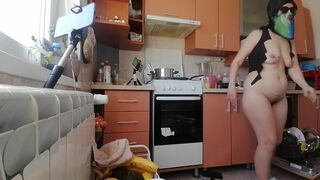 Hairy brunette milf, big tits, sensual hairy woman in the kitchen.